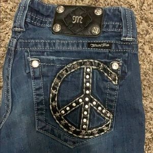 Peace sign Miss Me jeans